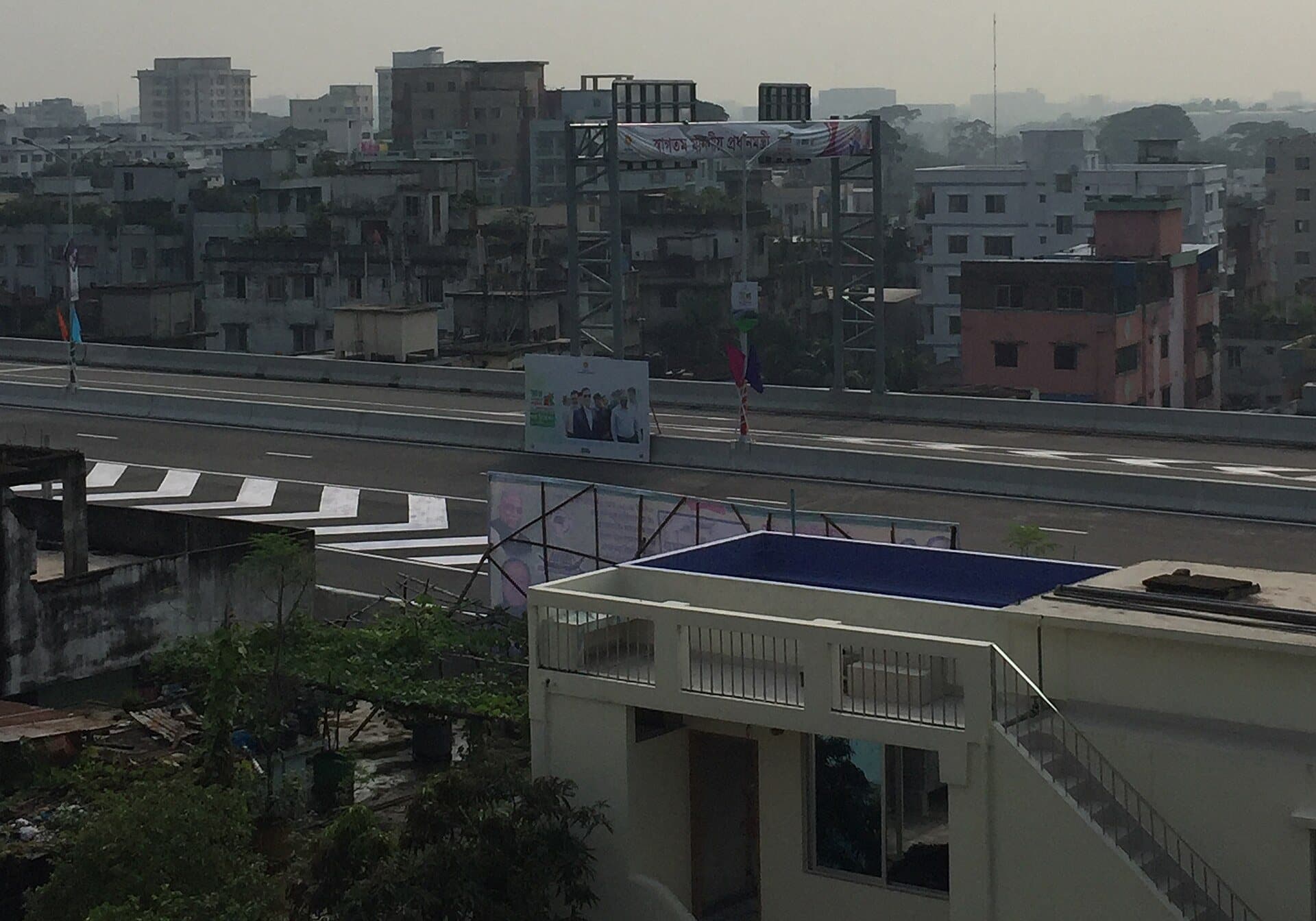 Lane lines and chevrons on the deck of the Dhaka Elevated Expressway